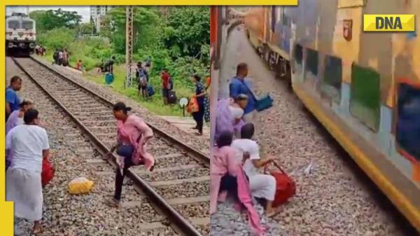 一名女子在被火车碾压前瞬间逃脱，看视频