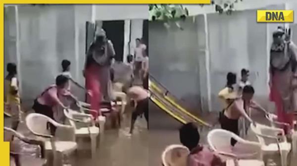 北方邦:一名教师进入洪水泛滥的学校，而学生们举着椅子的视频在网上疯传，之后她被停职